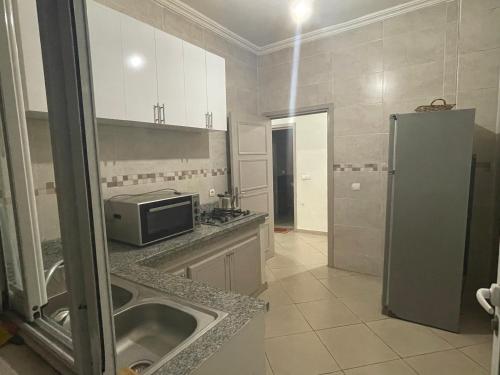 Kitchen, Appartement familiale au centre ville in El Khyam 2