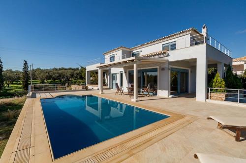 Luxury sea view villa with pool Porto Heli Agios Aimilianos - Location saisonnière - Porto Heli