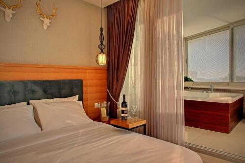 דירת נופש באכזיב עם ג'קוזי מול חוף בננה ביץ Dream Place Achziv in Ναχαριγια