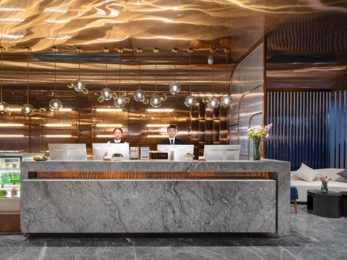 Echarm PLUS International Hotel Zhujiang New Town Wuyangcun Metro Station - Free Deliver Service to Canton Fair Complex During Canton Fair Period – Guangzhou (Canton), IA