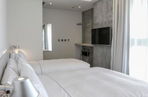 Quarto triplo, vista para a cidade