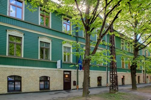 Janne Hotel with Self Check-in - Tap to explore photos