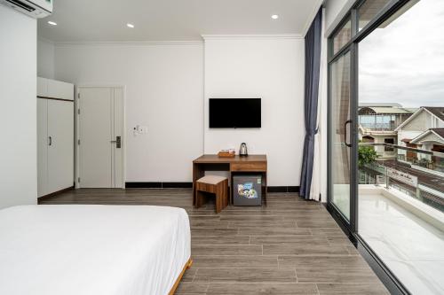 ห้องส่วนกลางสำหรับนั่งเล่น/ดูทีวี, UYÊN GIA โฮเทล-PHÚ QUỐC (UYÊN GIA HOTEL-PHÚ QUỐC) in เกาะฟู้โกว๊ก