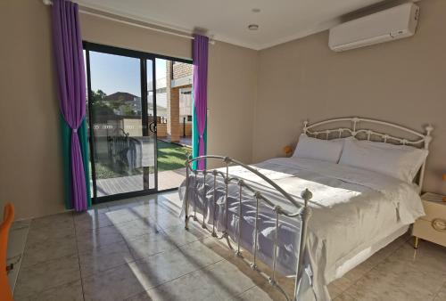 Sunny Ocean View Retreat Room Type - Double Room with Garden View