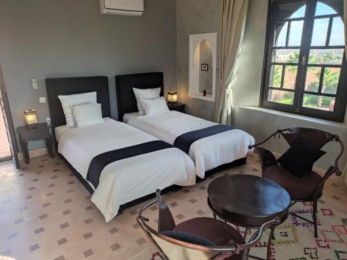 Chambre avec 2 lits