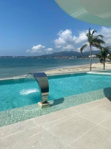 Apartamento en Bucerías frente al mar, condominio Tayau in Bucerías, Mexico