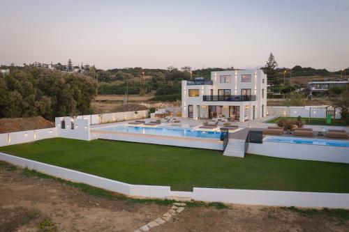 Asea Villa, Spectacular right-on-the-beach Retreat, By ThinkVilla