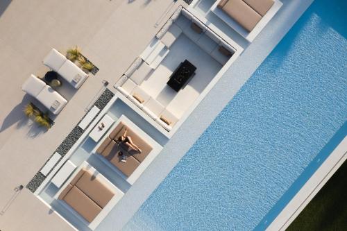 Asea Villa, Spectacular right-on-the-beach Retreat, By ThinkVilla