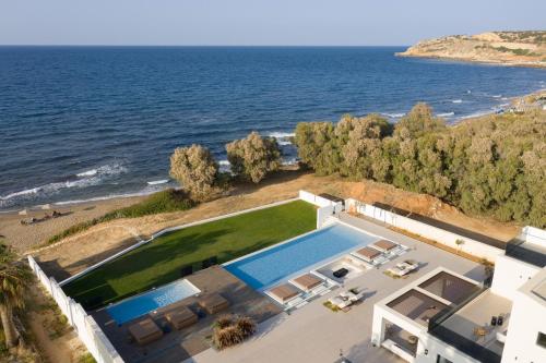 Asea Villa, Spectacular right-on-the-beach Retreat, By ThinkVilla