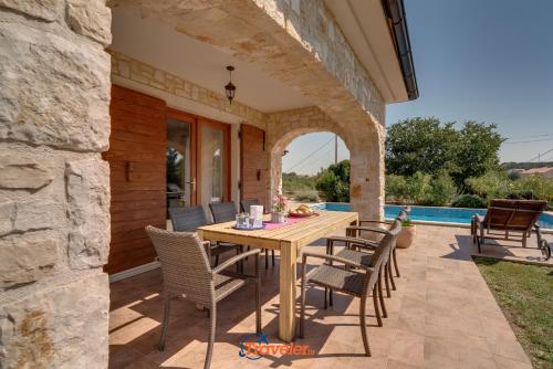 Romantic villa with a large pool and garden in a quiet area - by TRAVELER tourist agency Krk ID 2158