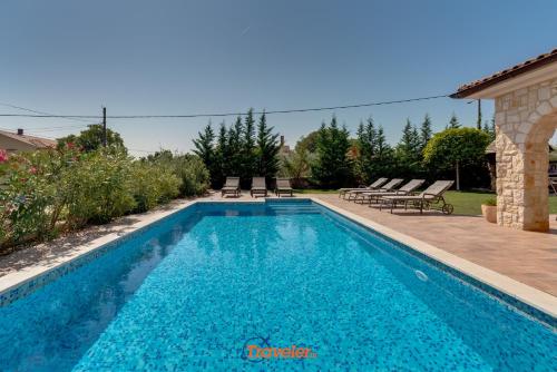 Romantic villa with a large pool and garden in a quiet area - by TRAVELER tourist agency Krk ID 2158