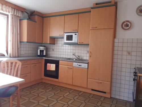ห้องครัว, Ferienwohnung Haus Bergfrieden in เกอร์ลอสเบอร์เกเบิน
