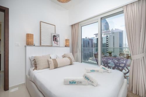 Business Bay Bliss 1 bedroom apartment - Suiteable, Dubai (Foto 3)