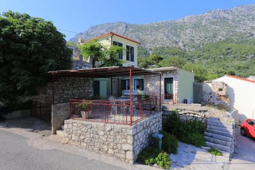 Apartments with a parking space Igrane, Makarska - 6796, Pension in Igrane
