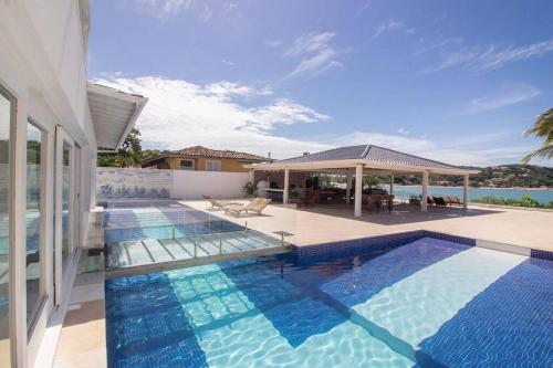 Mansão Pé na Areia da Ferradura Por Luxury Rentals (Mansao Pe na Areia da Ferradura Por Luxury Rentals) in plaža Ferradura