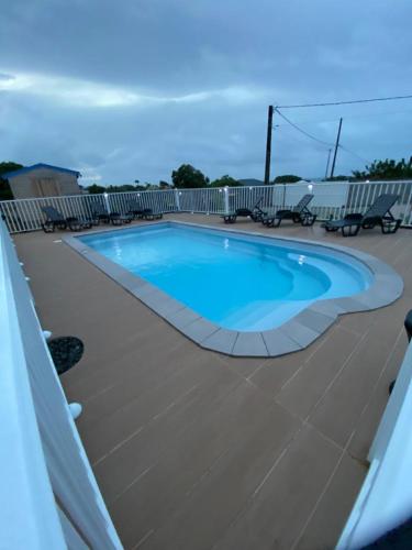 Les Terrasses de Vinty 3 villas autour d'une piscine