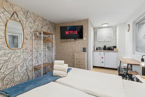Vorstadtoase - Apartment für 2 Personen mit Smart TV, Parken, eigenen Bad, Netflix - Nähe BER