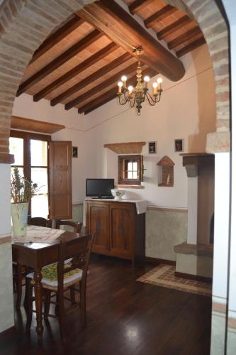 Közös társalgó / TV, Cortona Gabolina e Turata Holiday Home in Le Casine
