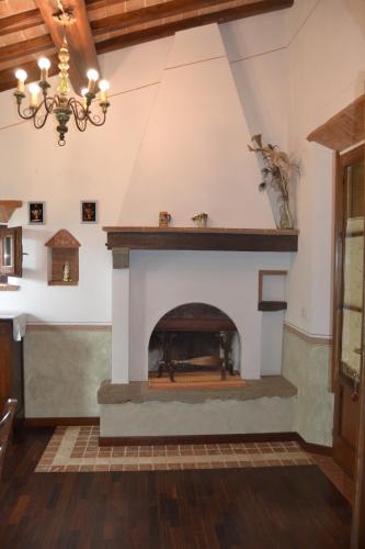 Közös társalgó / TV, Cortona Gabolina e Turata Holiday Home in Le Casine