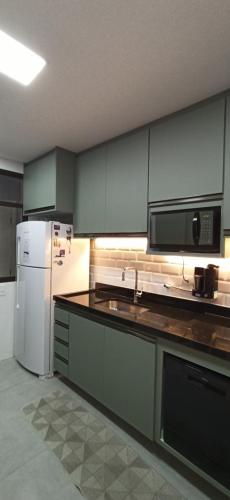 Kitchen, Apartamento Show! na Enseada Guaruja SP in Vila Julia