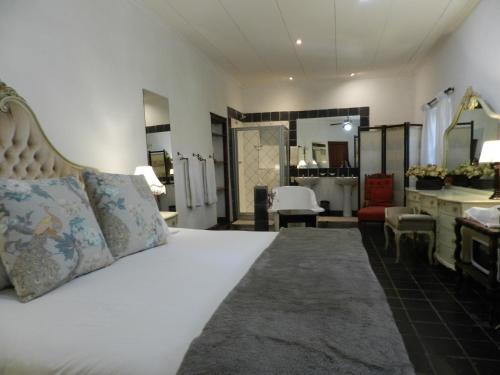 Zuhanyzó, President Paul Kruger Guest Lodge in Kroondal