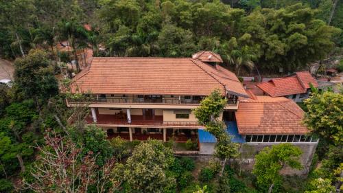 Udvendig, KINGMAKERS Plantation with river stream in Coorg