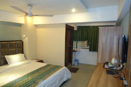 Hotel Maan Residency Satellite Road