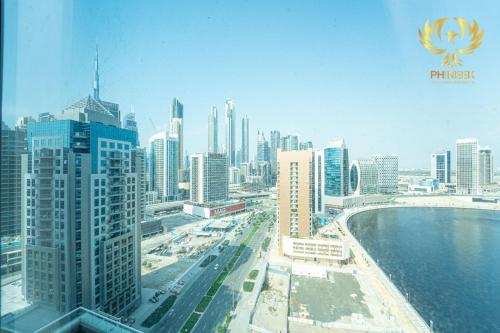 Damac Maison Canal Views Phineek Luxury 2BR Apartment, Dubaj (fotografie 2)