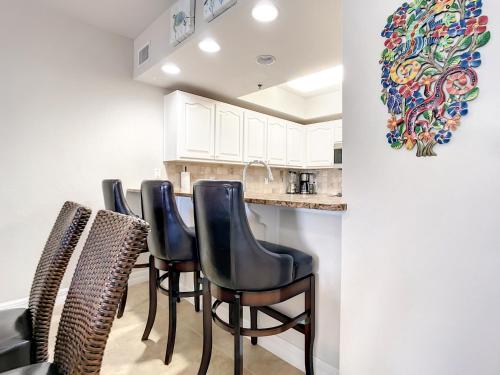 Set sail in this beautiful coastal themed 32 Condo with gorgeous ocean views OW13-305 in New Smyrna Beach, USA
