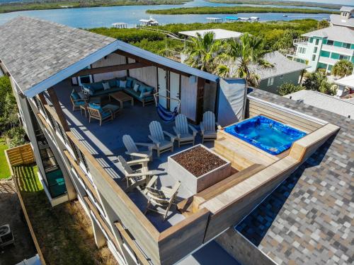 Enjoy the Best Time of the Year in Florida at Redfish Dance ~ Riverfront Pool Home with Dock - 6958T in New Smyrna Beach, USA