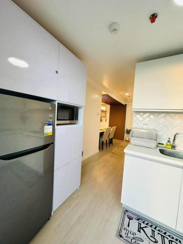 1 Bedroom - The Bali Getaway Azure North by THE BALI CORNER AT AZURE NORTH, High Floor, Big Balcony with Full View of Beach Resort Amenities, San Fernando (Foto 11)