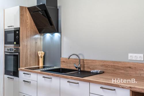 Kitchen, Spacious Cocoon with AC and PARKING At the Heart of Feytiat Limoges in Feytiat