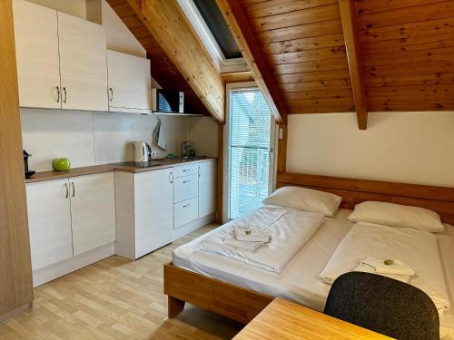 AJO Apartments - Alte Donau Lake or Garden View Balcony Studio - Self-Check-in - Tap to explore photos