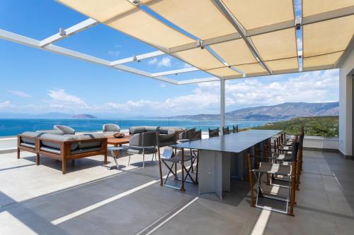 Villa Artemis - New Magnificent Beachfront Villa with Infinity Pool!