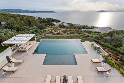 Villa Artemis - New Magnificent Beachfront Villa with Infinity Pool!