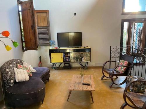 Koplietošanas atpūtas telpa ar TV, Casa Especial em Catas Altas in Catas Altas
