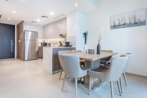 Three Bedroom Villa with Maid Room in Tilal Al Ghaf by The S Holiday Homes - image 9