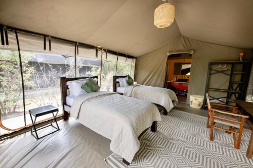 Olkinyei Mara Tented Camp