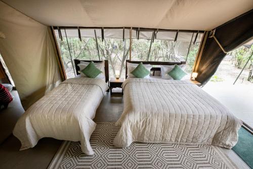 Olkinyei Mara Tented Camp