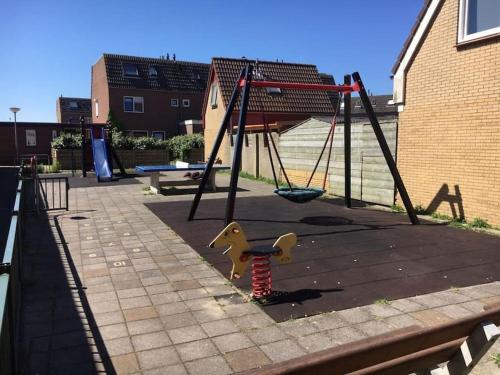 Parque infantil, Strand83 in Egmond aan Zee