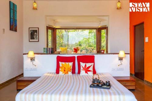 StayVista's House Below The Hill - A stylish Mountain-view villa with Pool and Games room