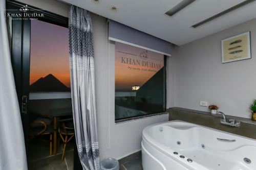 Khan Duidar Inn - Pyramids View Rooftop - Tap to explore photos
