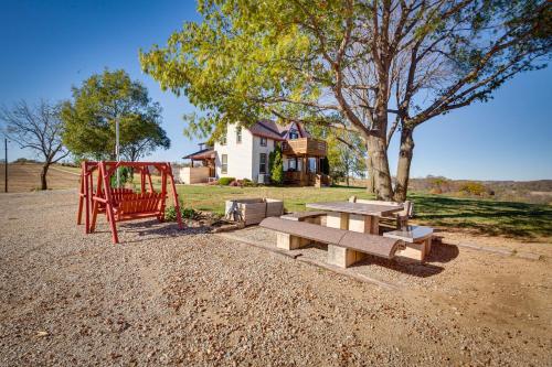 Historic Atchison Farmhouse with Patio Near Downtown