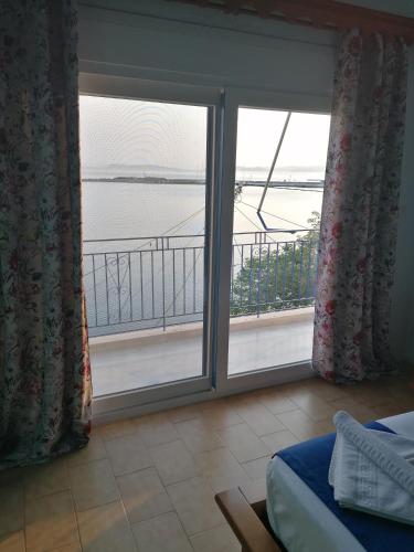 Panoramic Sea View Villa Evmenia and Harbourside Sea front apartments in Loutraki Skopelos