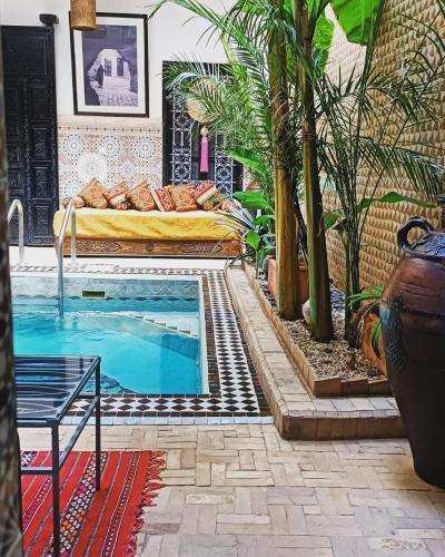 Riad Hugo - Tap to explore photos