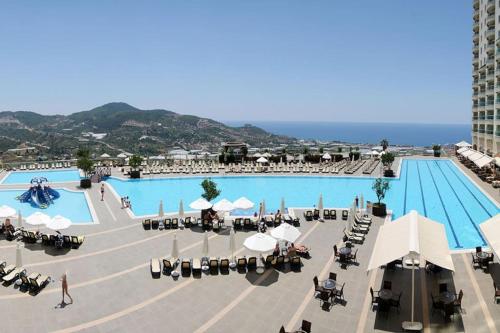 B&B Alanya - Gold City 5 star resort 2+1 appartement sea view and aqua park - Bed and Breakfast Alanya