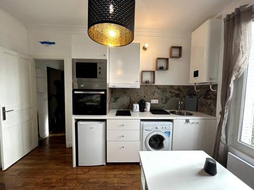 кухня, appartement proche de Paris Cosy et Lumineux in Ліврі-Гарган