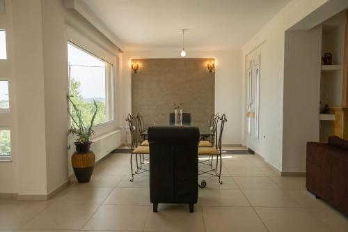 Közös társalgó / TV, Villa Portitsa in Mosxato