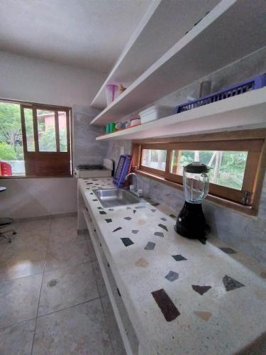 Kitchen, CABANA ACUARIO in El Bobo