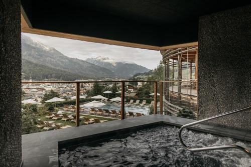Pezsgőfürdő, Naturhotel Leitlhof in Szent Candido